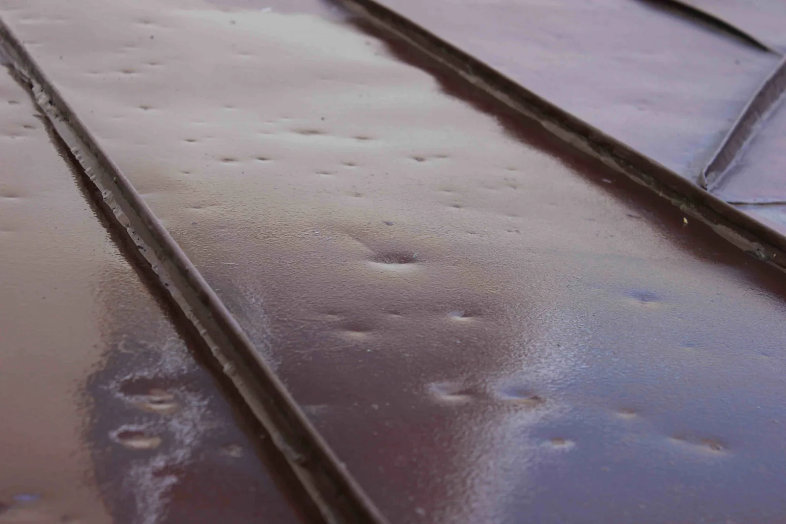 Hail damaged commercial roof in Columbia, MO